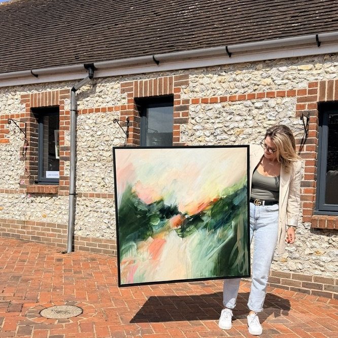 Joanna Gilbert with Aura, original abstract painting in a black float frame