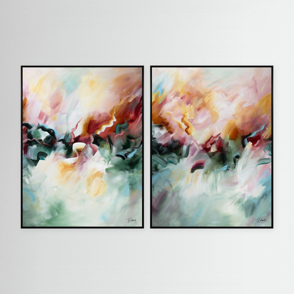 A Sunset's Embrace abstract diptych in black frames, a pair of vertical framed canvas prints by Joanna Gilbert.