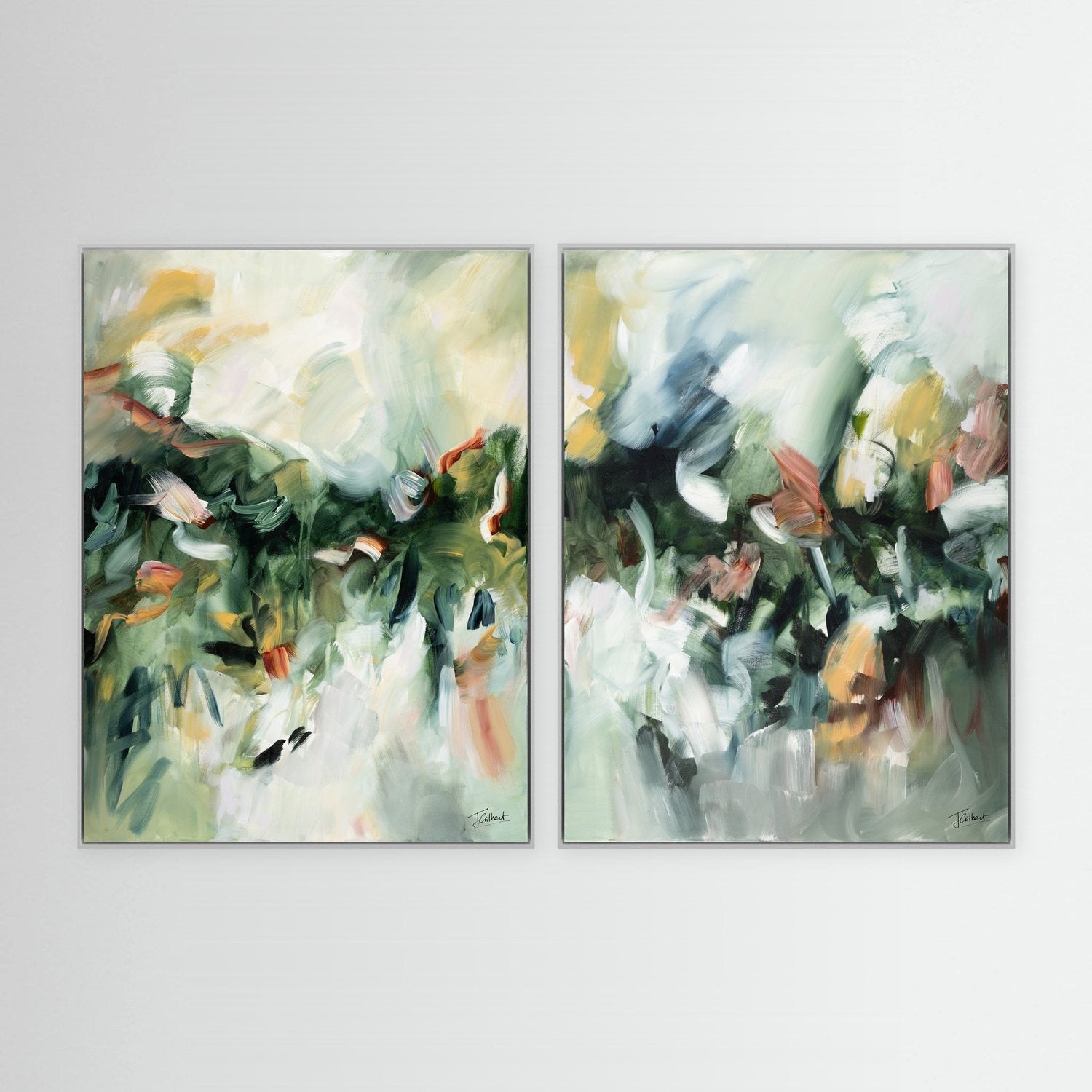 Movement in Green abstract diptych in white frames, a pair of vertical framed canvas prints by Joanna Gilbert.