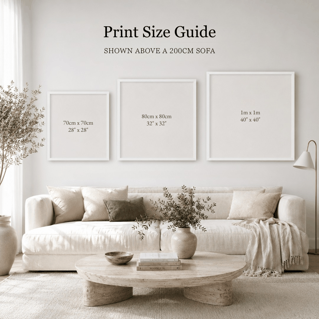 Print size guide showing 70cm, 80cm and 1m square framed prints above a 200cm sofa.