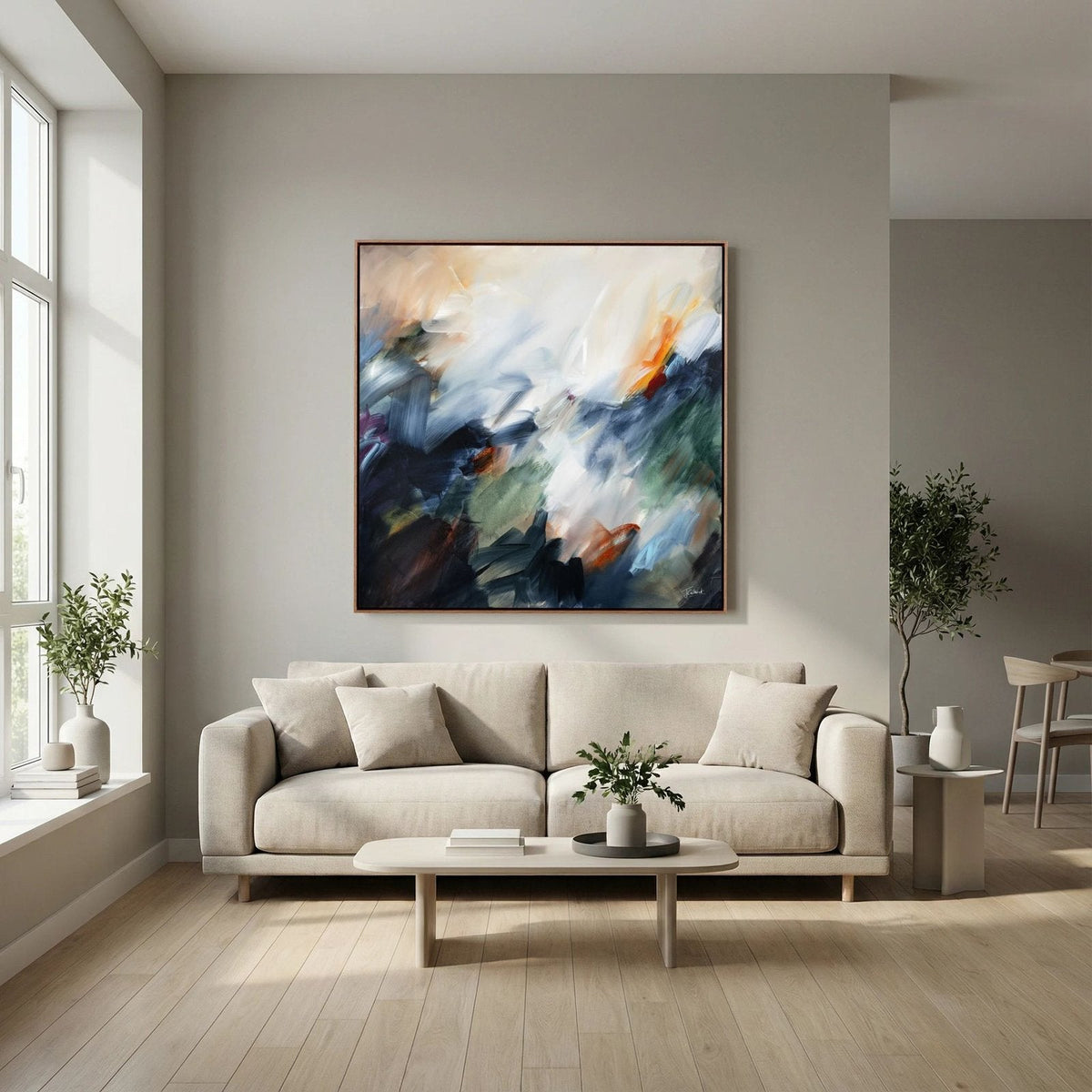 The Turning Point 1 abstract framed canvas print above a cream sofa in a calm living room.