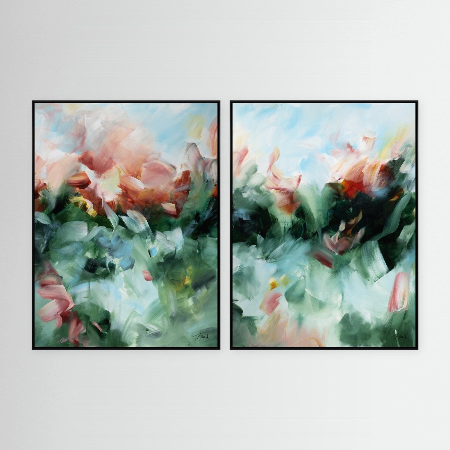 Emerald Glow abstract diptych in black frames, a pair of vertical framed canvas prints by Joanna Gilbert.